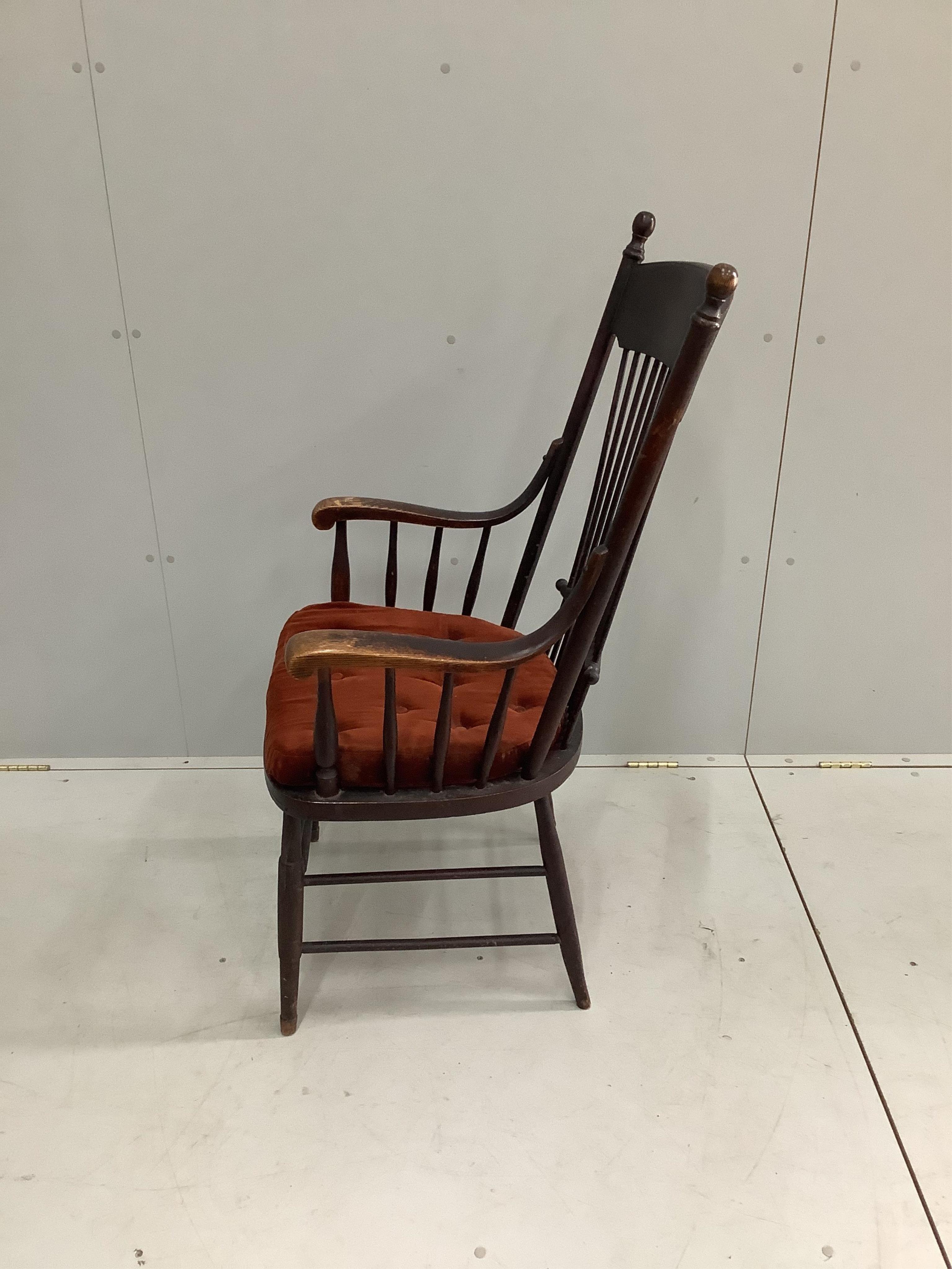 An early 20th century American ash armchair, width 60cm, depth 46cm, height 114cm. Condition - fair